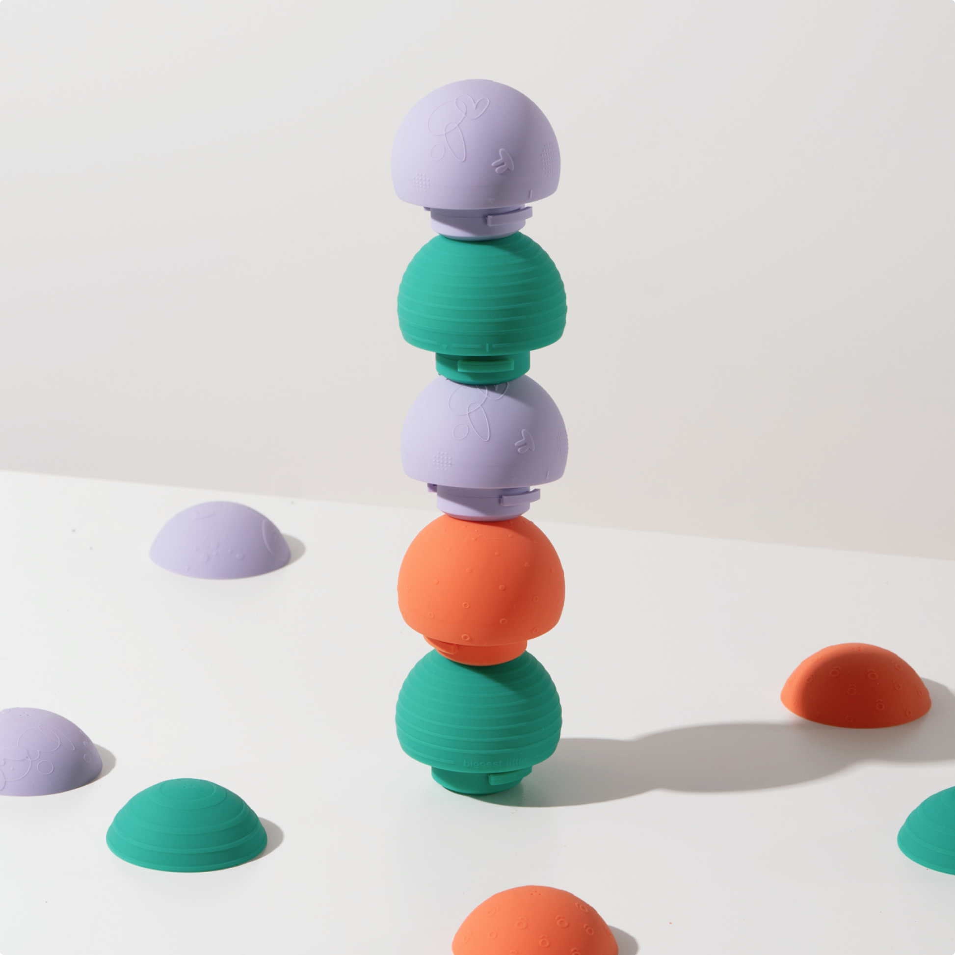 Green, orange, lilac B is for Ball stacker toy for play