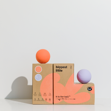 Orange and purple balls on eco-friendly packaging