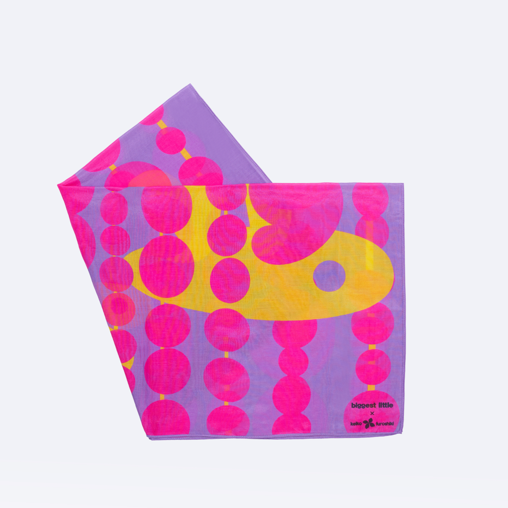 Neon pink and yellow patterned art play silk in "hide and seek" print on a light purple background