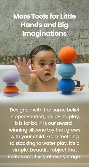 Baby playing with colorful b is for ball® toys in a bathtub, with text about the toys' design principles and features.